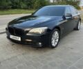 Черный БМВ 7 Серия, объемом двигателя 4.4 л и пробегом 300 тыс. км за 9500 $, фото 1 на Automoto.ua