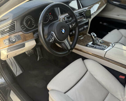 Черный БМВ 7 Серия, объемом двигателя 2.99 л и пробегом 390 тыс. км за 14000 $, фото 4 на Automoto.ua