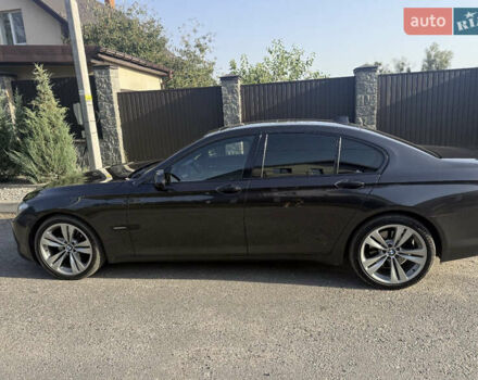 Черный БМВ 7 Серия, объемом двигателя 2.99 л и пробегом 390 тыс. км за 14000 $, фото 1 на Automoto.ua