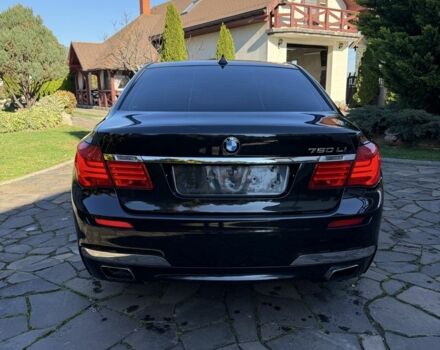 Черный БМВ 7 Серия, объемом двигателя 4.4 л и пробегом 300 тыс. км за 9990 $, фото 1 на Automoto.ua