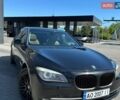 Черный БМВ 7 Серия, объемом двигателя 2.99 л и пробегом 445 тыс. км за 14000 $, фото 1 на Automoto.ua