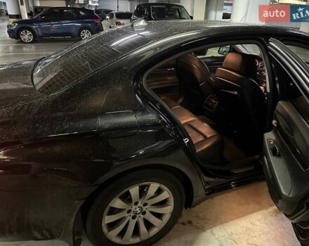 Черный БМВ 7 Серия, объемом двигателя 2.98 л и пробегом 300 тыс. км за 17000 $, фото 6 на Automoto.ua