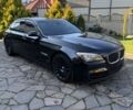 Черный БМВ 7 Серия, объемом двигателя 4.4 л и пробегом 300 тыс. км за 9990 $, фото 1 на Automoto.ua