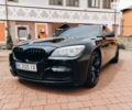 Черный БМВ 7 Серия, объемом двигателя 3 л и пробегом 212 тыс. км за 16000 $, фото 1 на Automoto.ua