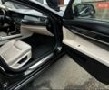 Черный БМВ 7 Серия, объемом двигателя 4.4 л и пробегом 168 тыс. км за 14500 $, фото 1 на Automoto.ua