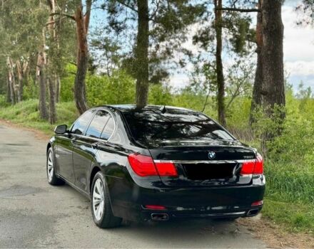 Черный БМВ 7 Серия, объемом двигателя 4.4 л и пробегом 220 тыс. км за 4300 $, фото 1 на Automoto.ua