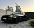 Черный БМВ 7 Серия, объемом двигателя 4.4 л и пробегом 230 тыс. км за 9996 $, фото 1 на Automoto.ua