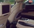 Черный БМВ 7 Серия, объемом двигателя 4.4 л и пробегом 195 тыс. км за 15800 $, фото 1 на Automoto.ua