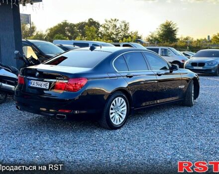 Черный БМВ 7 Серия, объемом двигателя 4.4 л и пробегом 200 тыс. км за 9999 $, фото 2 на Automoto.ua