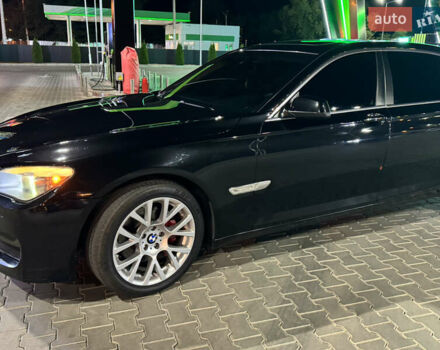 Черный БМВ 7 Серия, объемом двигателя 3 л и пробегом 299 тыс. км за 12600 $, фото 1 на Automoto.ua