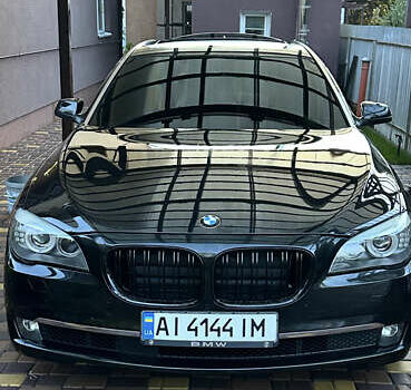 Черный БМВ 7 Серия, объемом двигателя 2.98 л и пробегом 147 тыс. км за 18000 $, фото 1 на Automoto.ua