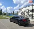 Черный БМВ 7 Серия, объемом двигателя 2.99 л и пробегом 270 тыс. км за 16000 $, фото 1 на Automoto.ua