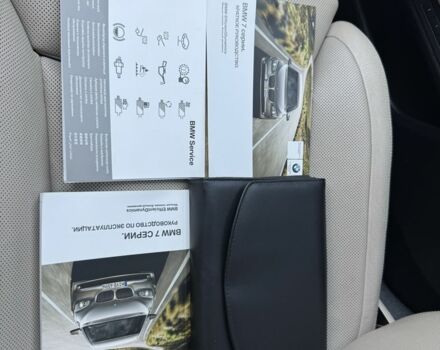 Черный БМВ 7 Серия, объемом двигателя 4.4 л и пробегом 80 тыс. км за 19333 $, фото 2 на Automoto.ua