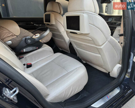 Черный БМВ 7 Серия, объемом двигателя 4.39 л и пробегом 275 тыс. км за 12800 $, фото 30 на Automoto.ua