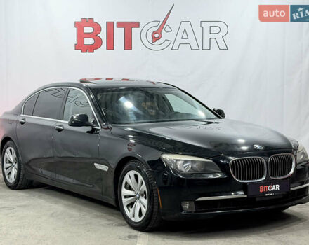 Черный БМВ 7 Серия, объемом двигателя 3 л и пробегом 200 тыс. км за 11200 $, фото 1 на Automoto.ua