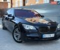 Черный БМВ 7 Серия, объемом двигателя 4.4 л и пробегом 270 тыс. км за 11999 $, фото 1 на Automoto.ua