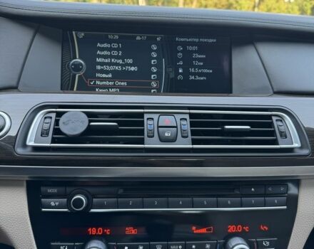 Черный БМВ 7 Серия, объемом двигателя 4.4 л и пробегом 80 тыс. км за 19333 $, фото 1 на Automoto.ua