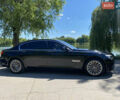 Черный БМВ 7 Серия, объемом двигателя 4.4 л и пробегом 145 тыс. км за 21500 $, фото 1 на Automoto.ua