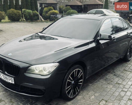 Черный БМВ 7 Серия, объемом двигателя 2.98 л и пробегом 285 тыс. км за 12500 $, фото 2 на Automoto.ua