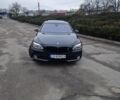 Чорний БМВ 7 Серія, об'ємом двигуна 3 л та пробігом 193 тис. км за 27500 $, фото 1 на Automoto.ua