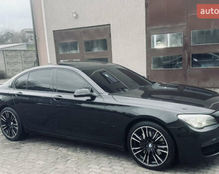 Черный БМВ 7 Серия, объемом двигателя 2.98 л и пробегом 285 тыс. км за 12500 $, фото 1 на Automoto.ua