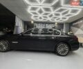 Чорний БМВ 7 Серія, об'ємом двигуна 3 л та пробігом 107 тис. км за 22000 $, фото 1 на Automoto.ua