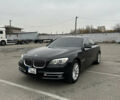 Черный БМВ 7 Серия, объемом двигателя 2.98 л и пробегом 204 тыс. км за 12300 $, фото 1 на Automoto.ua