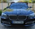Черный БМВ 7 Серия, объемом двигателя 2.99 л и пробегом 163 тыс. км за 25500 $, фото 1 на Automoto.ua