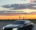 Черный БМВ 7 Серия, объемом двигателя 4.4 л и пробегом 153 тыс. км за 12499 $, фото 1 на Automoto.ua