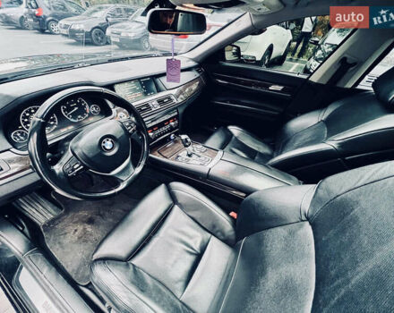 Черный БМВ 7 Серия, объемом двигателя 3 л и пробегом 210 тыс. км за 13200 $, фото 1 на Automoto.ua