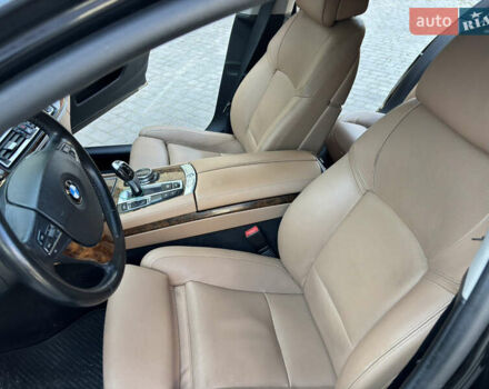 Черный БМВ 7 Серия, объемом двигателя 3 л и пробегом 196 тыс. км за 18600 $, фото 1 на Automoto.ua