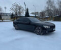 Черный БМВ 7 Серия, объемом двигателя 2.99 л и пробегом 243 тыс. км за 25000 $, фото 1 на Automoto.ua
