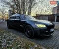 Чорний БМВ 7 Серія, об'ємом двигуна 2.98 л та пробігом 157 тис. км за 20000 $, фото 1 на Automoto.ua