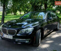 Черный БМВ 7 Серия, объемом двигателя 2.98 л и пробегом 200 тыс. км за 26000 $, фото 1 на Automoto.ua