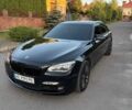 Черный БМВ 7 Серия, объемом двигателя 4.4 л и пробегом 248 тыс. км за 18300 $, фото 1 на Automoto.ua