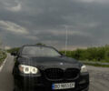 Черный БМВ 7 Серия, объемом двигателя 3 л и пробегом 240 тыс. км за 13500 $, фото 1 на Automoto.ua