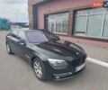 Черный БМВ 7 Серия, объемом двигателя 2.99 л и пробегом 187 тыс. км за 23000 $, фото 1 на Automoto.ua