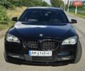 Черный БМВ 7 Серия, объемом двигателя 4.4 л и пробегом 370 тыс. км за 25000 $, фото 1 на Automoto.ua