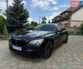 Черный БМВ 7 Серия, объемом двигателя 2.98 л и пробегом 186 тыс. км за 15500 $, фото 1 на Automoto.ua