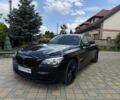 Чорний БМВ 7 Серія, об'ємом двигуна 3 л та пробігом 190 тис. км за 15555 $, фото 1 на Automoto.ua