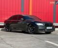 Черный БМВ 7 Серия, объемом двигателя 4.4 л и пробегом 212 тыс. км за 16500 $, фото 1 на Automoto.ua