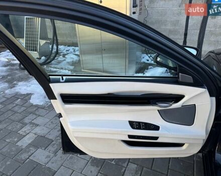 Черный БМВ 7 Серия, объемом двигателя 3 л и пробегом 224 тыс. км за 25500 $, фото 77 на Automoto.ua