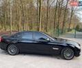 Чорний БМВ 7 Серія, об'ємом двигуна 3 л та пробігом 240 тис. км за 21000 $, фото 1 на Automoto.ua