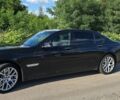 Черный БМВ 7 Серия, объемом двигателя 4.4 л и пробегом 370 тыс. км за 25000 $, фото 1 на Automoto.ua