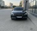 Черный БМВ 7 Серия, объемом двигателя 3 л и пробегом 161 тыс. км за 28000 $, фото 1 на Automoto.ua