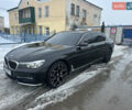 Чорний БМВ 7 Серія, об'ємом двигуна 3 л та пробігом 148 тис. км за 27000 $, фото 1 на Automoto.ua