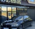 Черный БМВ 7 Серия, объемом двигателя 4.4 л и пробегом 160 тыс. км за 26500 $, фото 1 на Automoto.ua