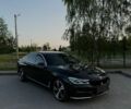 Черный БМВ 7 Серия, объемом двигателя 3 л и пробегом 111 тыс. км за 33000 $, фото 1 на Automoto.ua