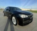 Черный БМВ 7 Серия, объемом двигателя 4.4 л и пробегом 80 тыс. км за 6150 $, фото 1 на Automoto.ua