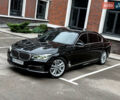 Черный БМВ 7 Серия, объемом двигателя 4.4 л и пробегом 185 тыс. км за 24700 $, фото 1 на Automoto.ua
